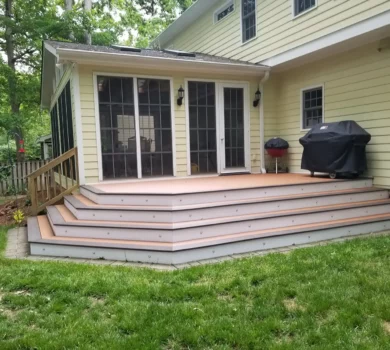 Yellow house with light TimberTech decking