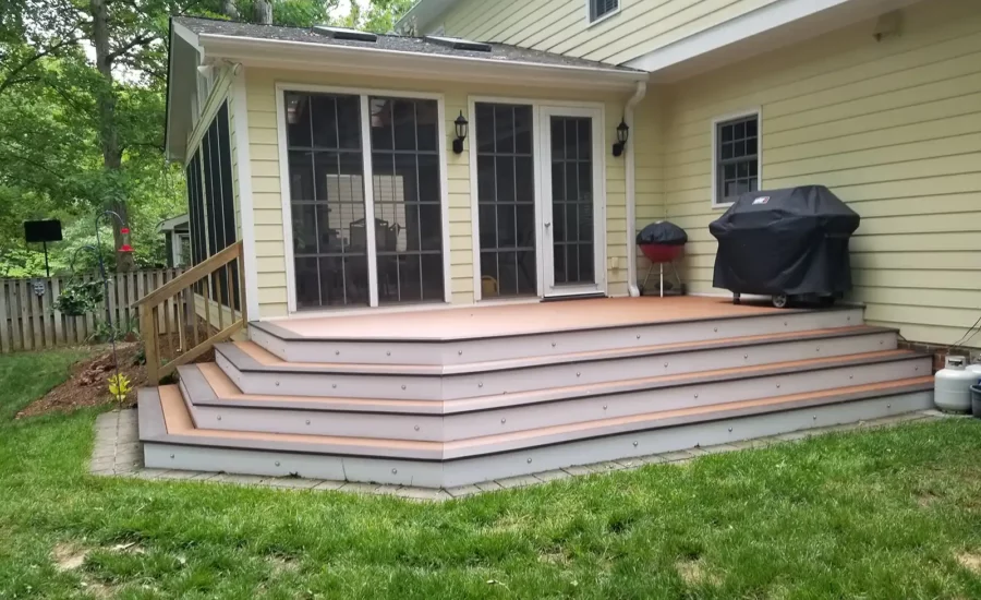 Yellow house with light TimberTech decking