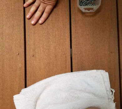 Closeup of TimberTech decking with cleaning cloth