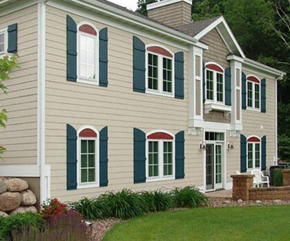 House with white Biscuit Diamond Kote siding