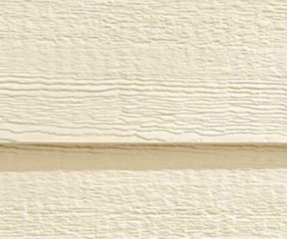 Closeup of white Biscuit Diamond Kote siding