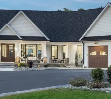 A large home, clad with Diamon Kote Siding at dusk