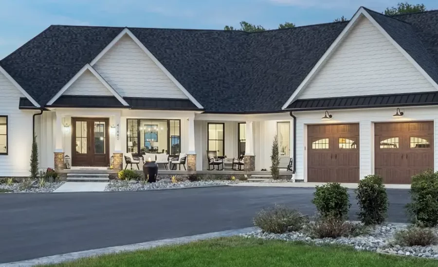 A large home, clad with Diamon Kote Siding at dusk