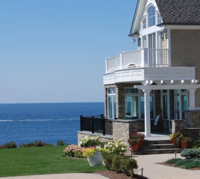 Coastal home with PVC decking and trim overlooking the seaside