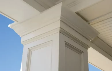 A closeup detail of a porch column made with Azek PVC trim and mouldings