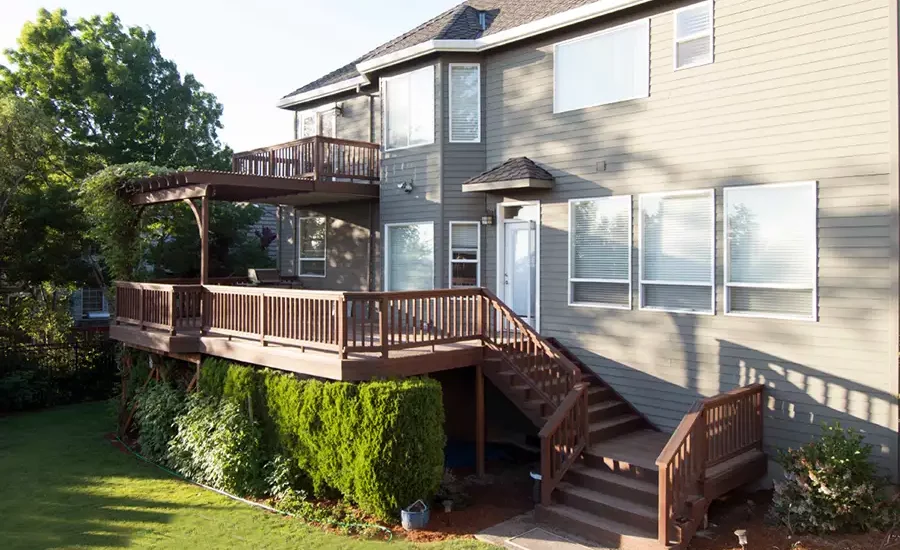 A large bi-level deck made of Ipe decking material on a bright sunny day