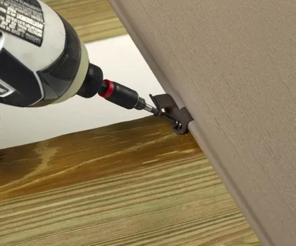 Installation of CONCEALoc fasteners into a deck board