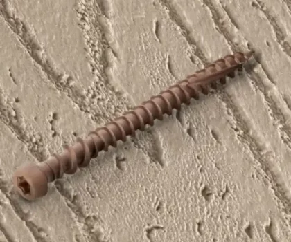 Captor XD decking fastener laying on composite deck board