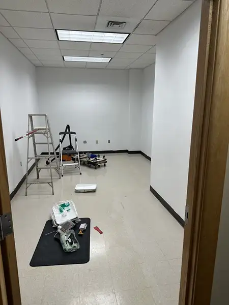 A room in the process of being painted.